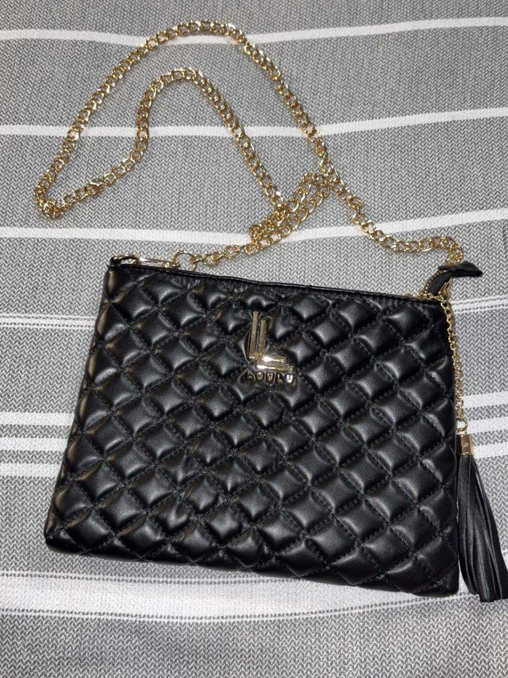 Quilted Black Crossbody Bag with Gold Chain and Tassel